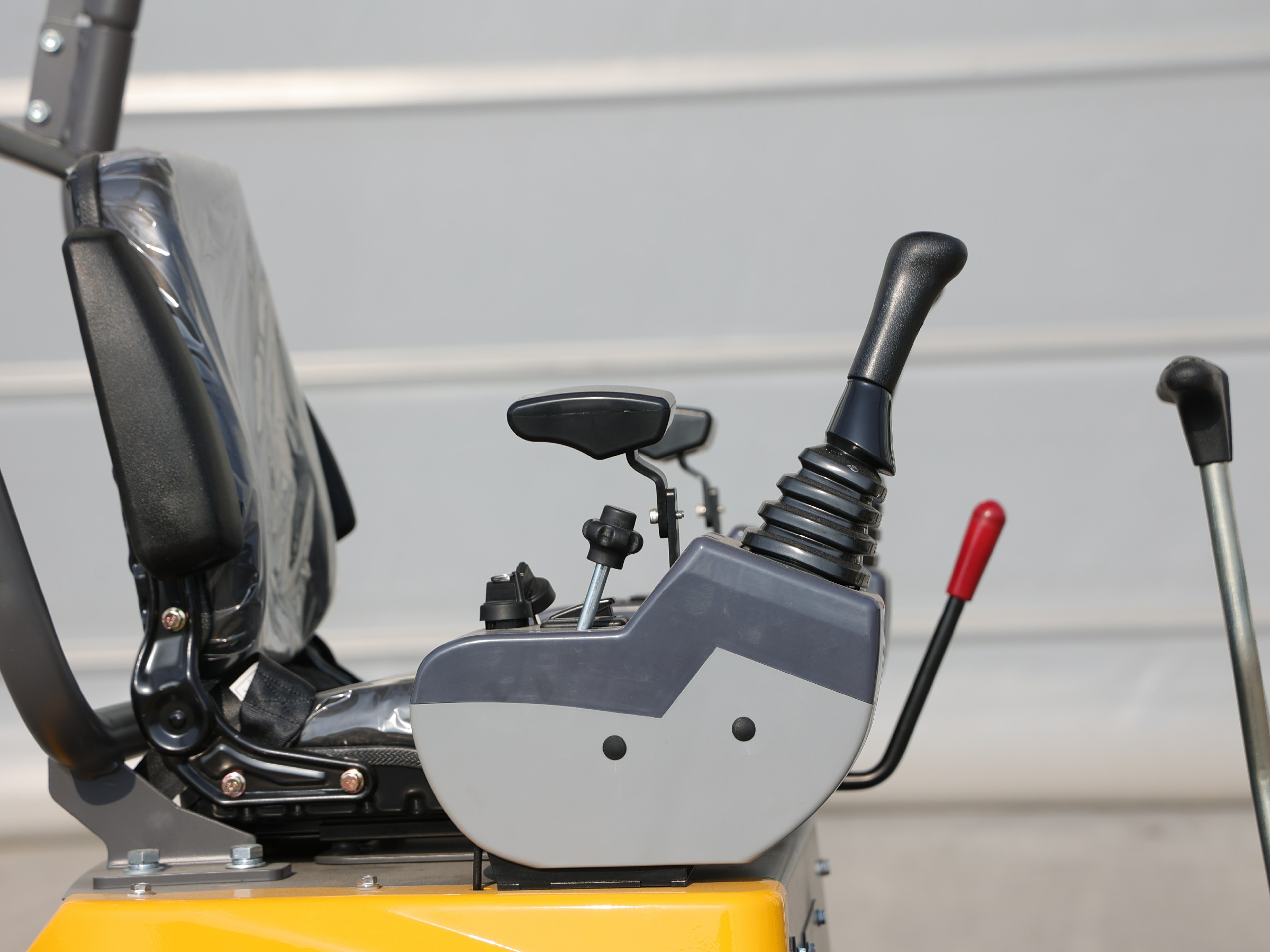 Close-up of the HY12 seat and joystick controls