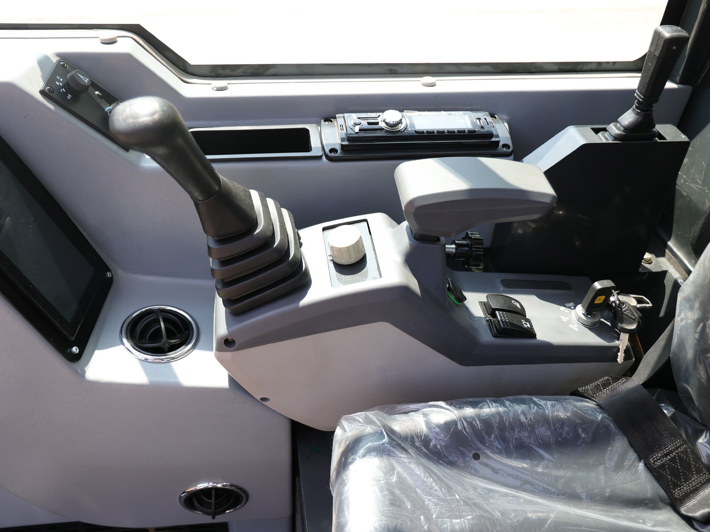 Close-up of the HY35C cab interior, joystick and dashboard