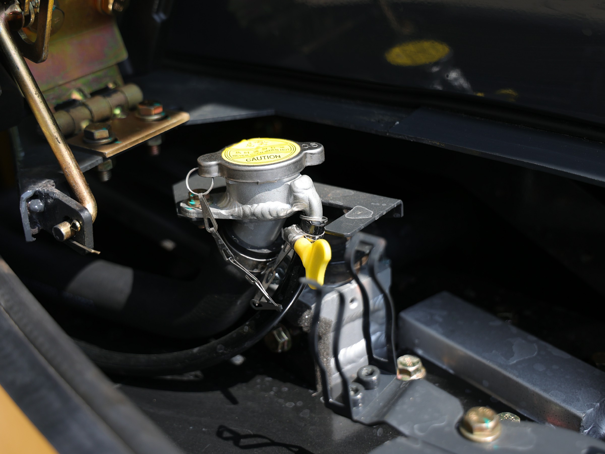 Close-up of the HY35C radiator cap and engine bay